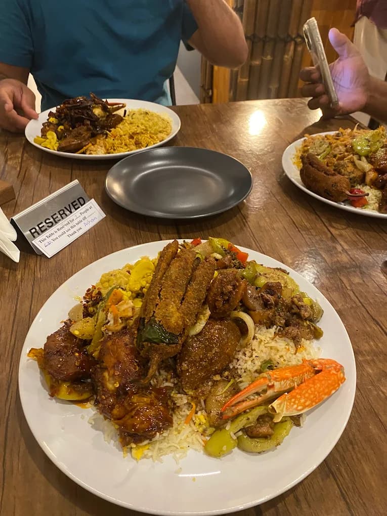 A plate of seafood rice and curry